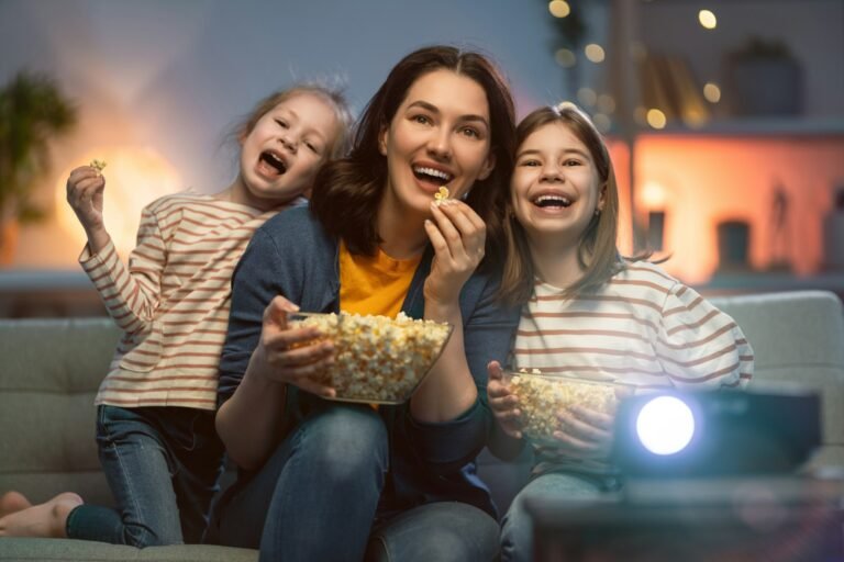 Family enjoying movies at home with Strong IPTV